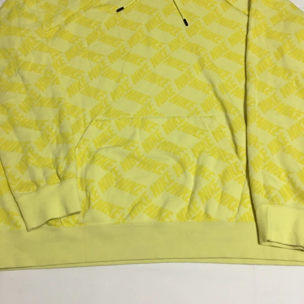 Nike Sportswear Essentials Pullover Hoodie Womens XL Yellow All Over Print Logo